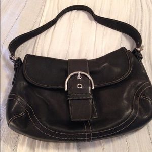 Classic Coach purse. Black with silver accents.